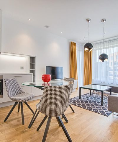 two-chairs-with-glass-table-on-living-room-near-window.jpg